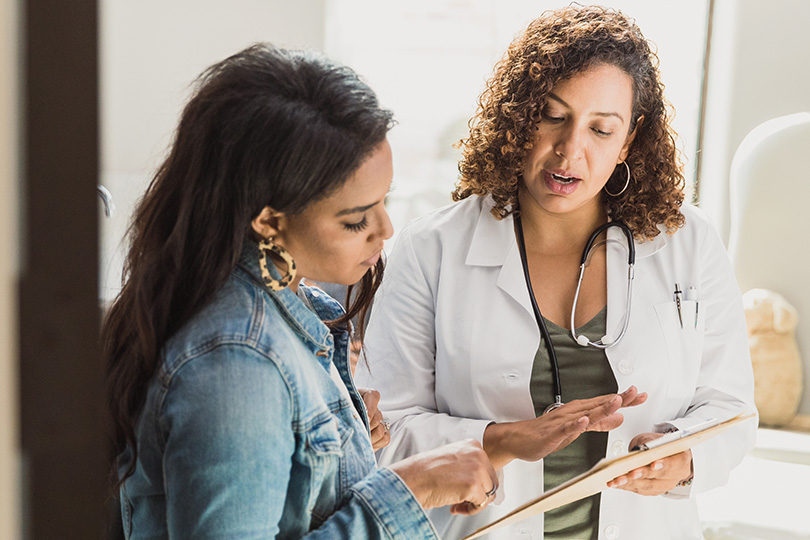 Doctor discussing with patient about Lipoprotein