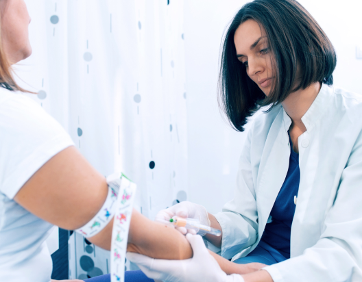 Woman takes a blood test for diabetes.