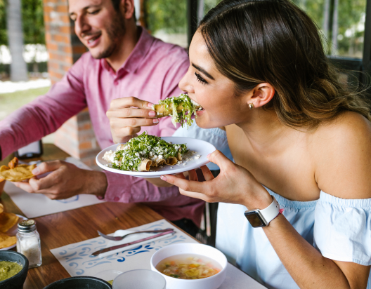 Woman enjoys healthy food.